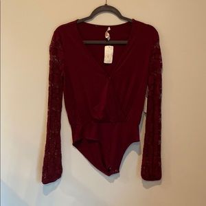 Lace sleeve body suit